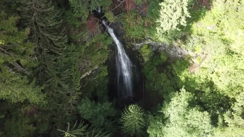 Drone flying over a waterfall 4k wild landscape Stock Footage 137921075