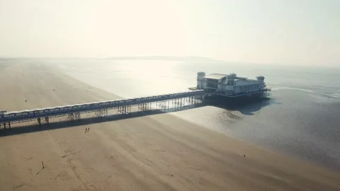 Drone flying over Weston-super-Mare Pier Stock Footage 135818347