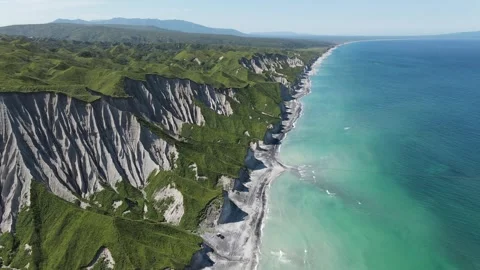 Drone flying over white rocks and coastline of Iturup Island, Kuril islands Video stock 242003725