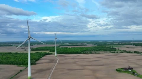 Drone flying over windmill farm Stock Footage 196091598