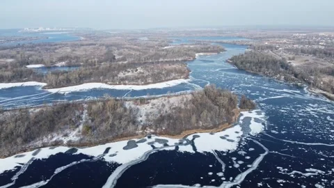 Drone flying over winter Dnipro river with the Kyiv city background 스톡 동영상 199991470