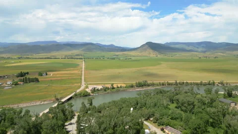 Drone Flying over Yellowstone River in Summer Stock Footage 285799273