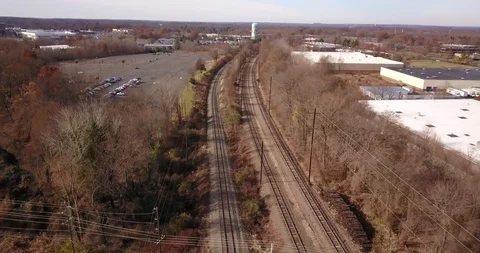 Drone flying parallax over train tracks fall 스톡 동영상 120303272