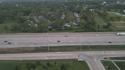 Drone flying in parallel with the highway during the day Video stock 242721430