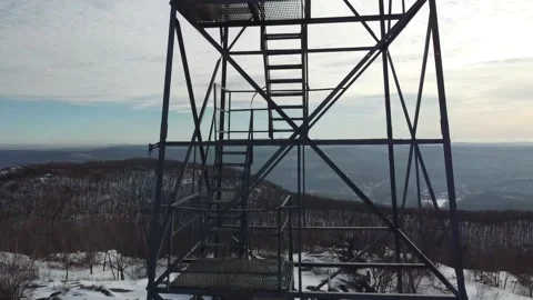 Drone flying up revealing Fire Tower with valley in Background 60 FPS. Stock Footage 156061746