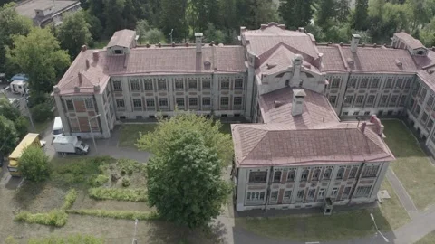 Drone flying right over historic building complex Video stock 333011477