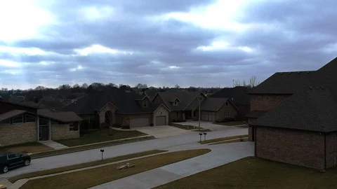 Drone Flying shot of local small town with cool clouds filter 库存影片 123925295