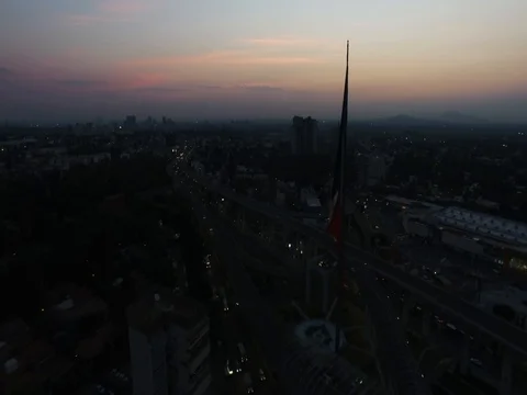Drone flying side of national flag in San Jeronimo Mexico City sunrise Vidéo 74626616
