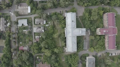 Drone flying sideways over buildings top view Stock Footage 333012583