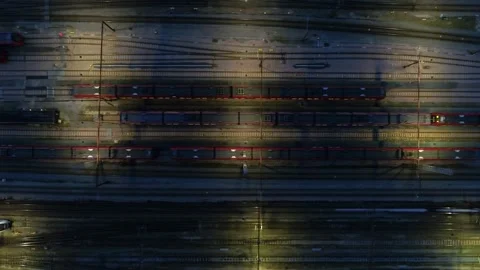 Drone flying sideways over rows of stagnant trains in the evening Stock Footage 269674069