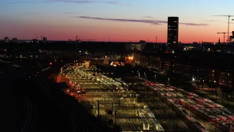 Drone flying sideways over rows of stagnant trains at night time Stock Footage 269674107