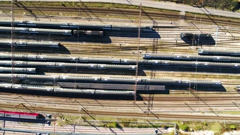 Drone flying sideways over rows of stagnant trains Stock Footage 269675042