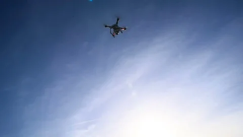 Drone flying in sky in park Stock Footage 83142718
