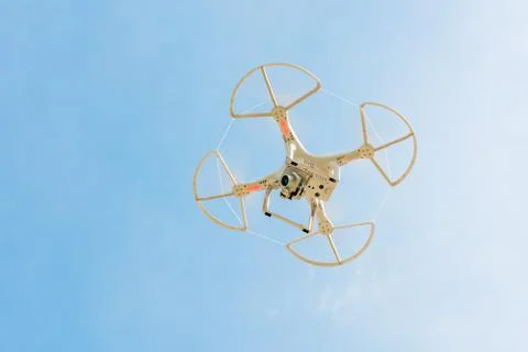 Drone flying in the sky. Stock Photos