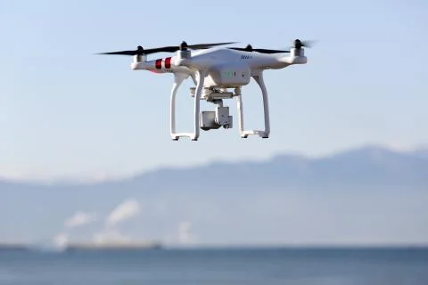Drone flying in the sky Stock Photos