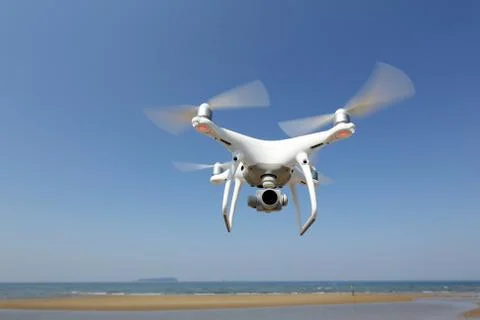 Drone flying in the sky Stock Photos