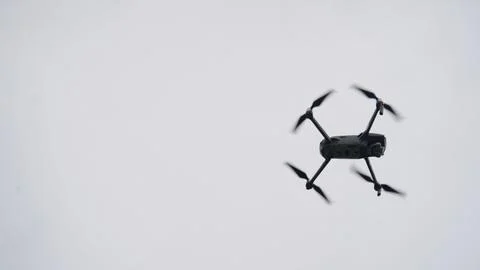 Drone flying in the sky. Stock Photos
