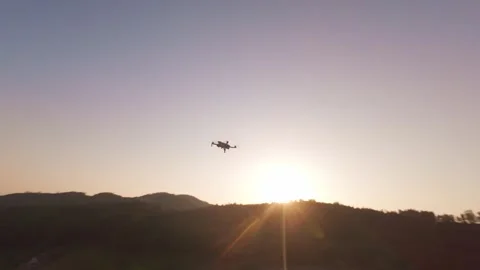 Drone Flying in the Sky at Sunset, Aerial View Stock Footage 341237752