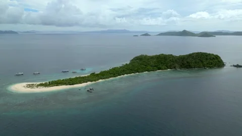 Drone Flying to Snake Island during an expedition from El Nido to Coron Video stock 317025385