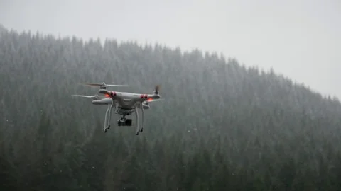 Drone flying in snow slow motion Stock Footage 70145990