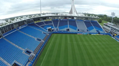Drone flying a soccer field in a stadium Stock Footage 63960224