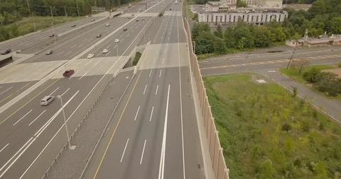 Drone flying straight on right over NJ turnpike Stock Footage 95035870