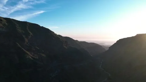 Drone Flying From Sunset Over Dramatic Valley Under Clear Sky – Gran Canaria Stock Footage 309949096