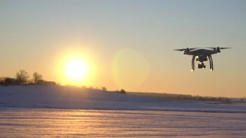 Drone flying in the sunset, winter scene Stock Footage 71962587