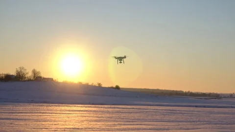 Drone flying in the sunset, winter scene Video stock 71962688