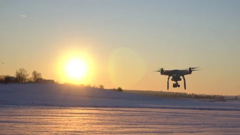 Drone flying in the sunset, winter scene Stock Footage 71962732