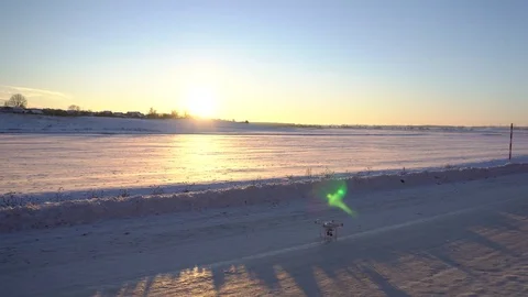 Drone flying in the sunset, winter scene Stock Footage 71997971