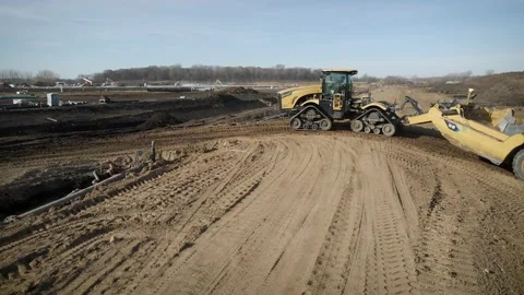 Drone Flying Through Active Construction Site Showing Scraper Stock Footage 145377951