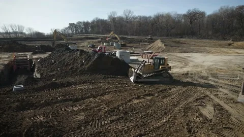 Drone Flying Through Active Construction Site With Heavy Machinery Stock Footage 145378019