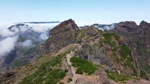 Drone flying through amazing mountains and clouds Stock Footage 162544033