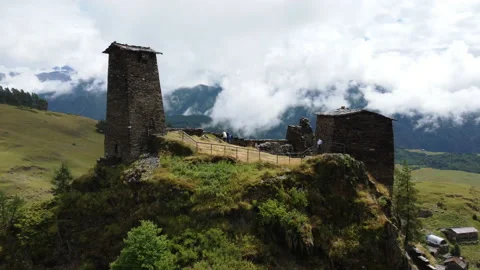 Drone flying through the ancient monastery ruins in Caucasus mountains 스톡 동영상 229879945