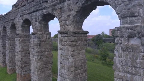 Drone Flying Through An Ancient Roman Aqueduct In Rome, Italy Stock Footage 154883420