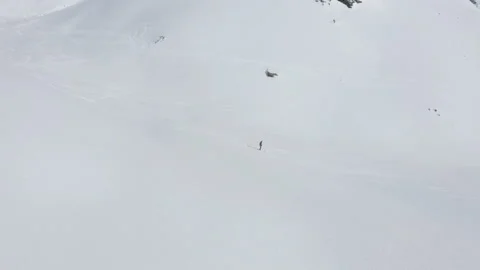 Drone flying through beautiful snowy mountains. Stock Footage 143363689