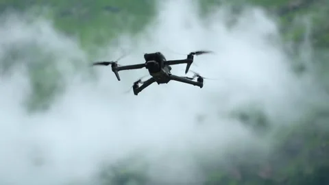 Drone Flying Through Cloudy Mountain Sky Stock Footage 316891284