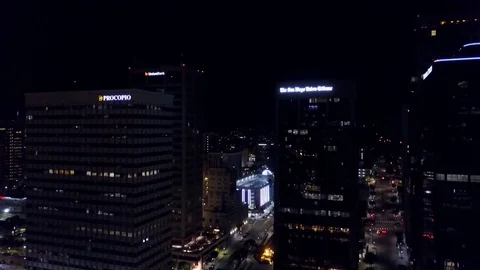 Drone flying through downtown at night Stock Footage 71135635
