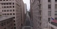 Drone Flying Through Empty Streets Of A Financial District Stock Footage