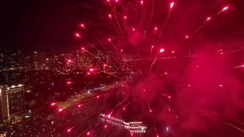 Drone flying through fireworks, Ala Moana Honolulu Hawaii Stock Footage 291023477