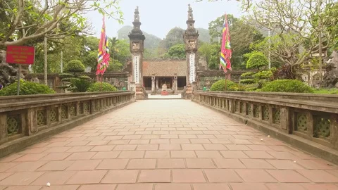 Drone flying through Hoa Lu Ancient Capital of Vietnam in the 10th and 11th c Stock Footage 128049183