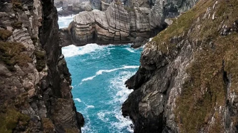 Drone flying through Island cliffs in Ireland, Aerial view near of Mizen Head Stock Footage 233195733