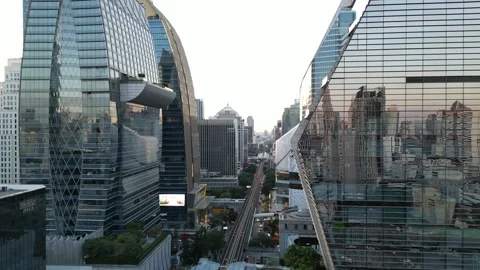 Drone Flying Through Modern Bangkok Cityscape Skyscraper Canyon in Bangkok, Stock Footage 335587629