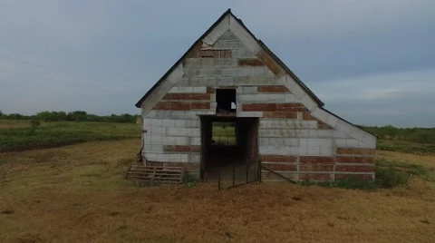Drone flying through a rusted barn in Central Texas. Stock Footage 60793623