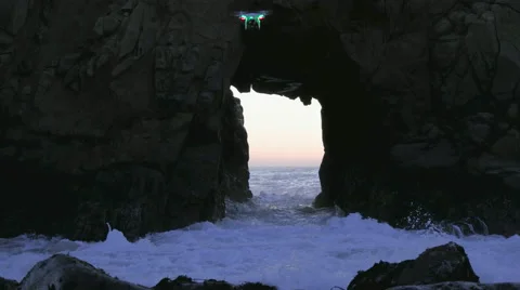 Drone flying through Sea Arch Video stock 57922617