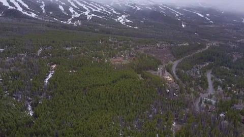 Drone Flying Through Snow Over Forest In Colorado Rocky Mountains Video stock 82808464
