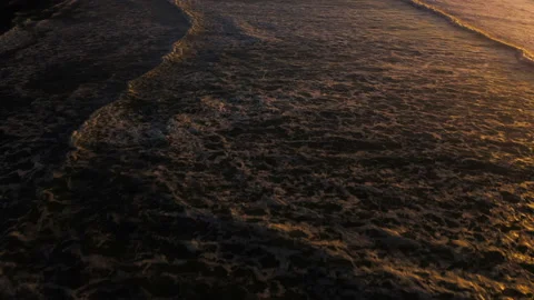 Drone flying through the sunset of Canon Beach, Oregon Stock Footage 145820166