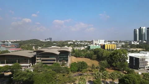 Drone flying through swimming pool and flying towards offices and shopping mall Stock Footage 149383458
