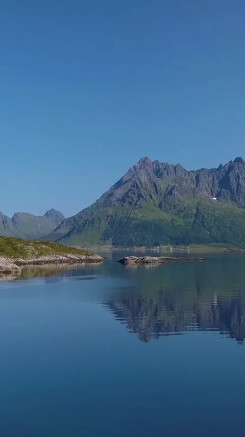 The drone is flying through a tent located on the shore of the Norwegian fjord. Stock Footage 258895905